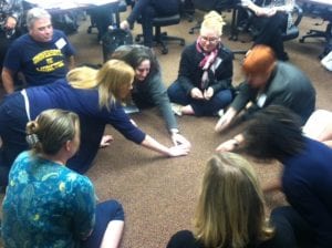 Teachers participate in PopEd lesson One for All