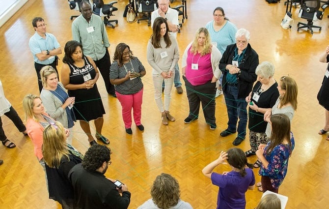 PopEd staff lead educators through the lesson "Web of Life"