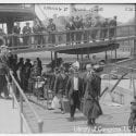 Photograph of immigrants arriving to Ellis Island, circa 1915