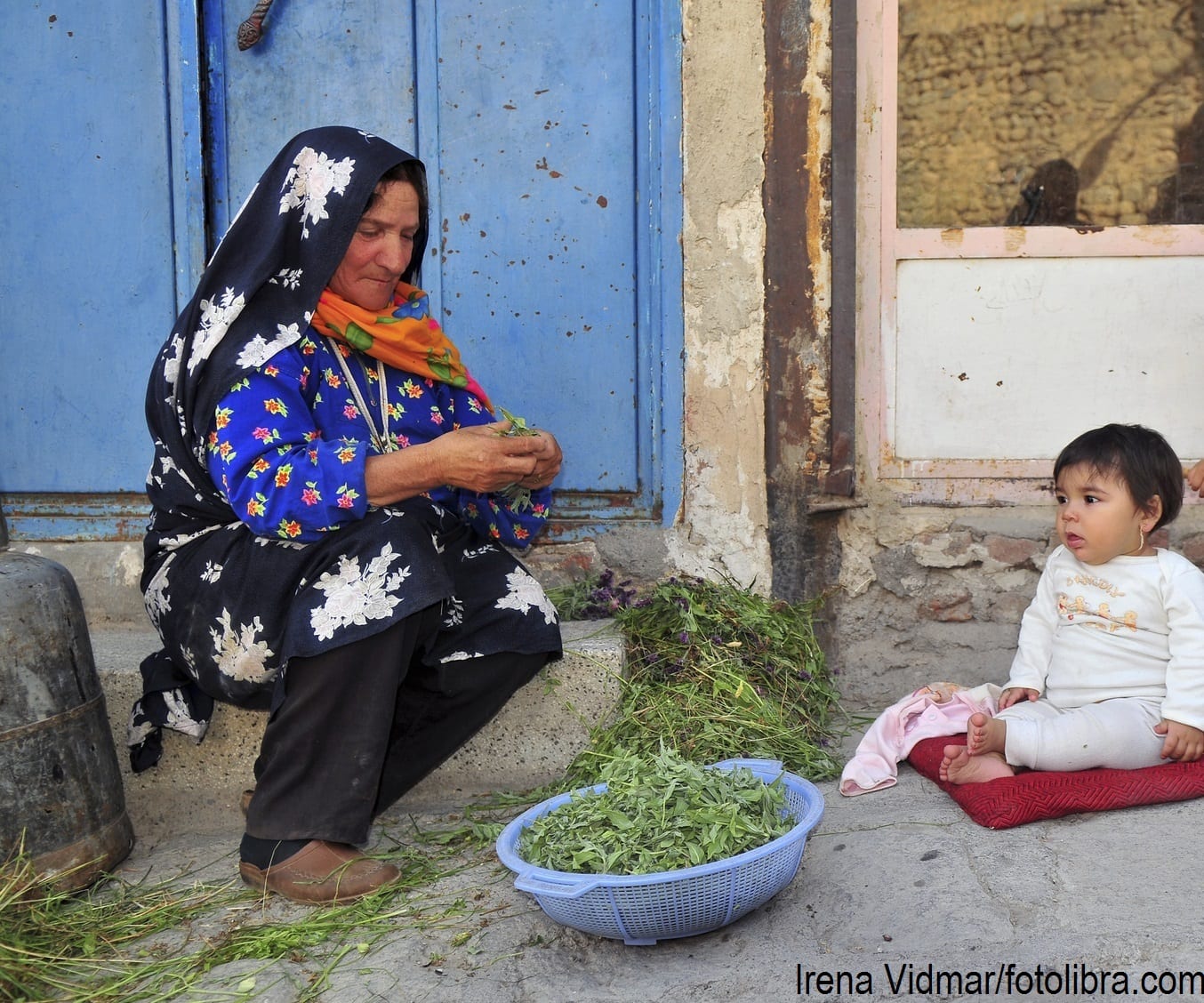 A woman with her grandchildren in Iran.
