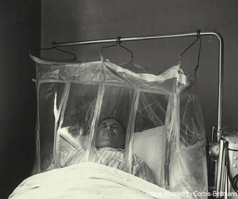 Patient resting in an oxygen tent due to air pollution in Denora, PA, 1948