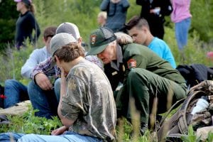 Citizen science coordinator assists students with data collection