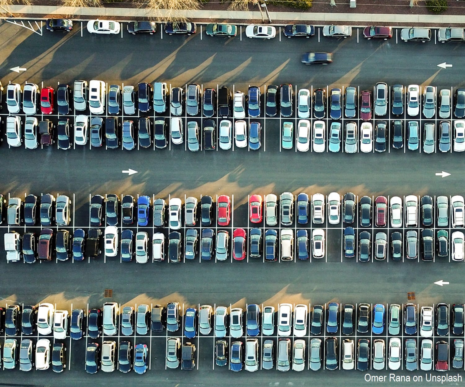 Parking lot full of cars shows Americans' dependence on car culture