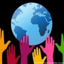 Colorful hands lift up for the Earth and young students learn how they can be stewards of the planet