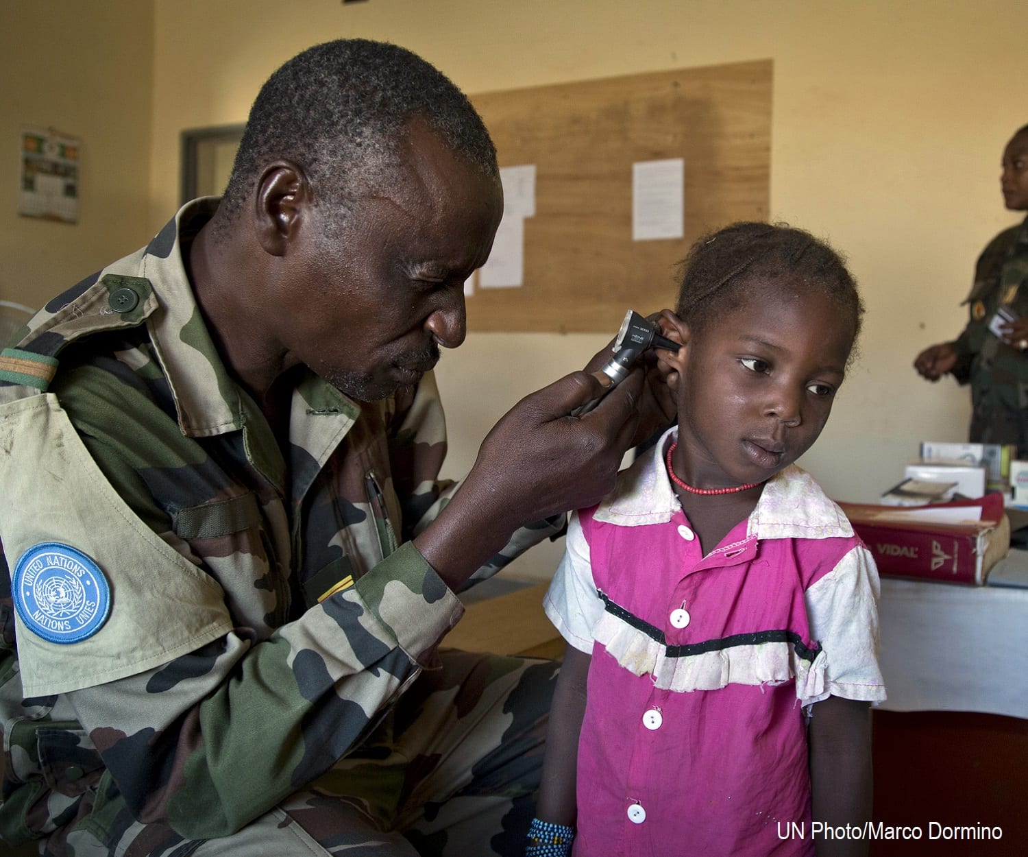 Young child at a health clinic getting a check up
