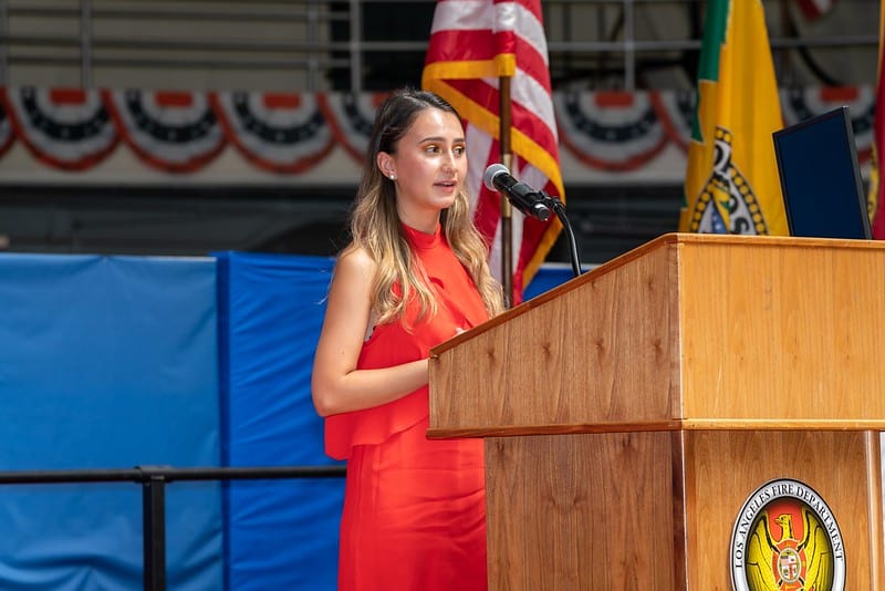 High school student public speaking at podium