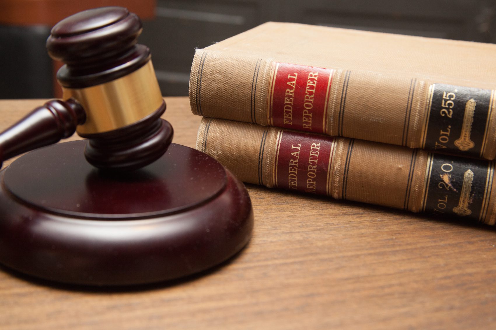 Gavel and law books in a courtroom