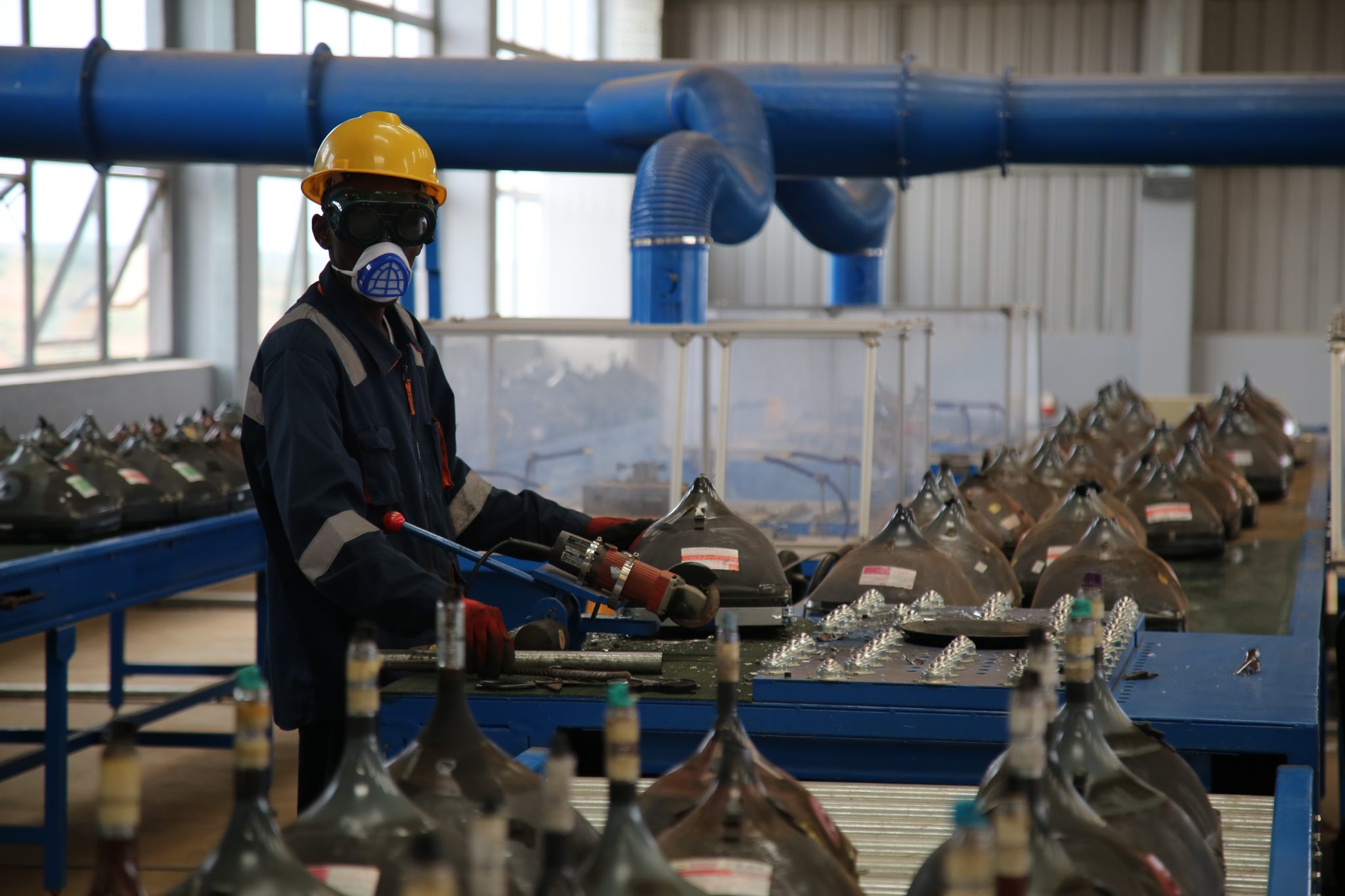 Man treating waste in a recycling facility