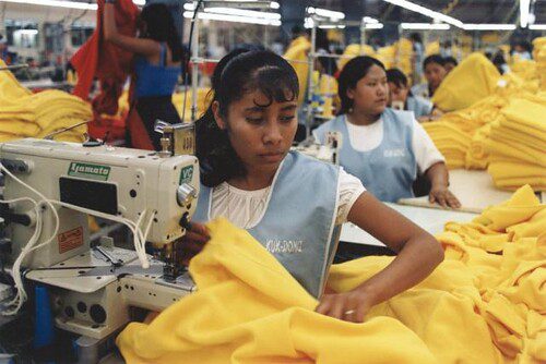 Young women working in a sweatshop