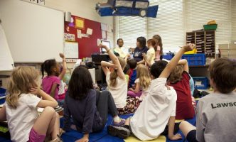 Young students reading together