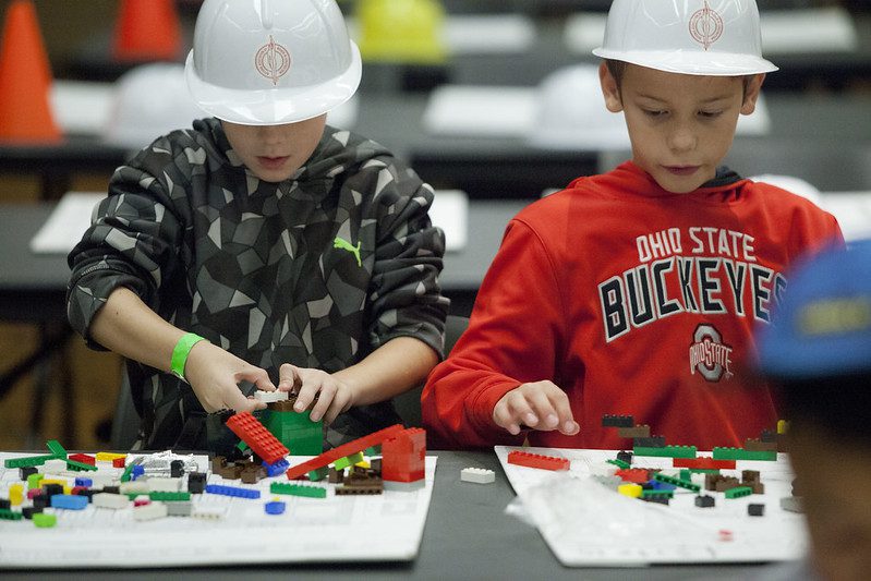 Two elementary-aged boys engaging in STEAM practices during the 2017 Block Kids building competition 