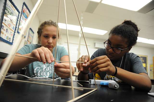 Middle school students’ STEAM activity is building balsa wood towers 