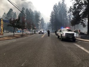 USDA Forest Service Law Enforcement assist after the 2018 Camp Fire swept through communities in northern California.