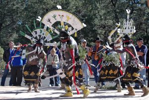 The Dishchii' Bikoh' Apache Group from Arizona demonstrates the Apache Crown Dance during a celebration of Native American Heritage Month.