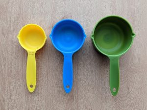 ¼ cup, ½ cup, and 1 cup measuring cups.