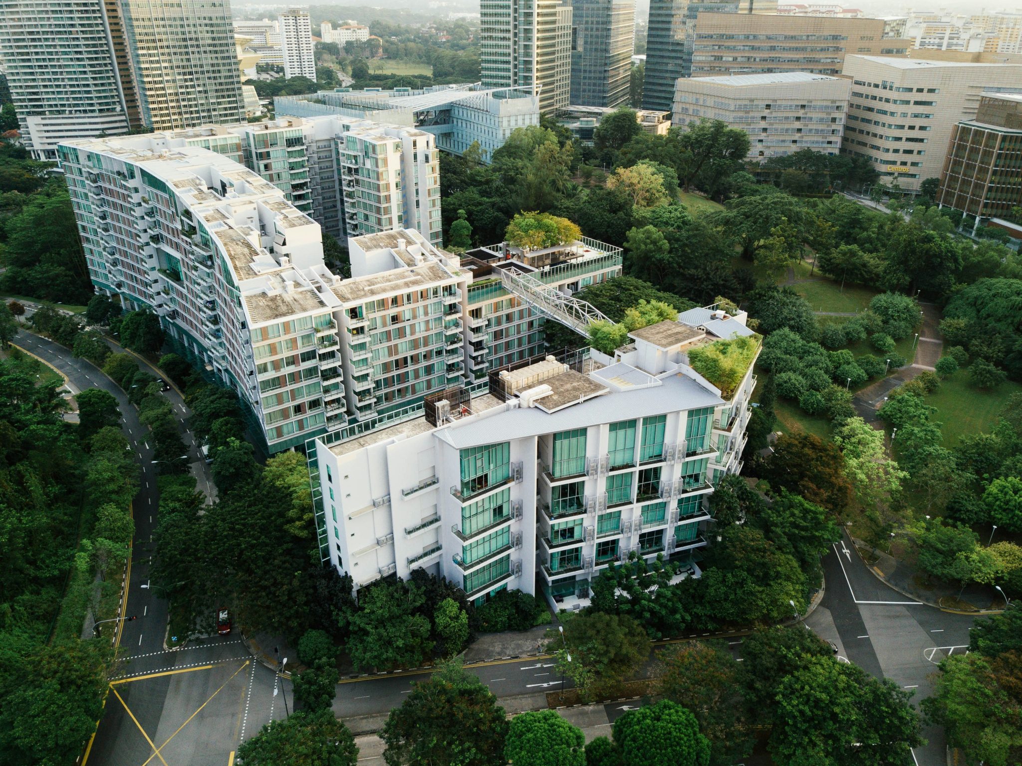 Urban building complex surrounded by trees and green space