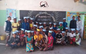 Students at La Marmaille Mangily, a rural school that receives support from Lemur Love, pose for a graduation photo after passing their exams.