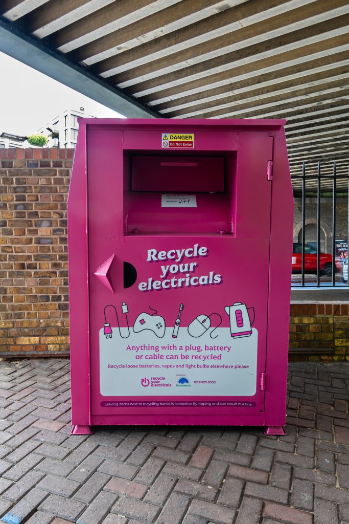 A pink bin for recycling small electricals in England, part of a program to combat e-waste.