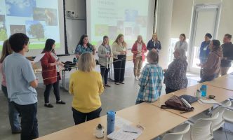 Teachers participate in the Web of Life simulation at the MAMEA conference