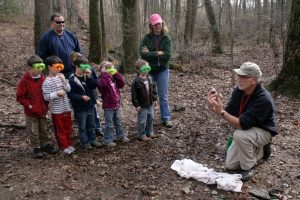 A first grade class learns about rocks during a field trip to their local Outdoor Education center.