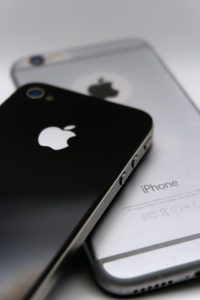 Two smartphones, an example of resource-intensive products.